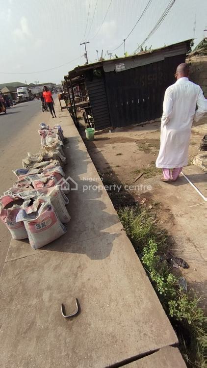 1000sqmts of Land Wit 4nos of 3 Bed Flat, a 2 Bed Flat with 15 Shops, Nnpc, Ejigbo, Ejigbo, Lagos, Hotel / Guest House for Sale