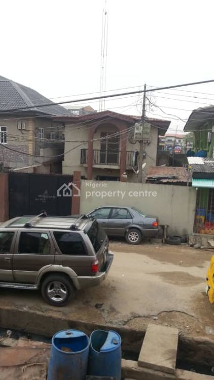 a Plot with Demolished Off The Major Road with C of O, Off Ejigbo Bus Stop Isolo Ejigb Jakande Road, Ejigbo, Lagos, Mixed-use Land for Sale