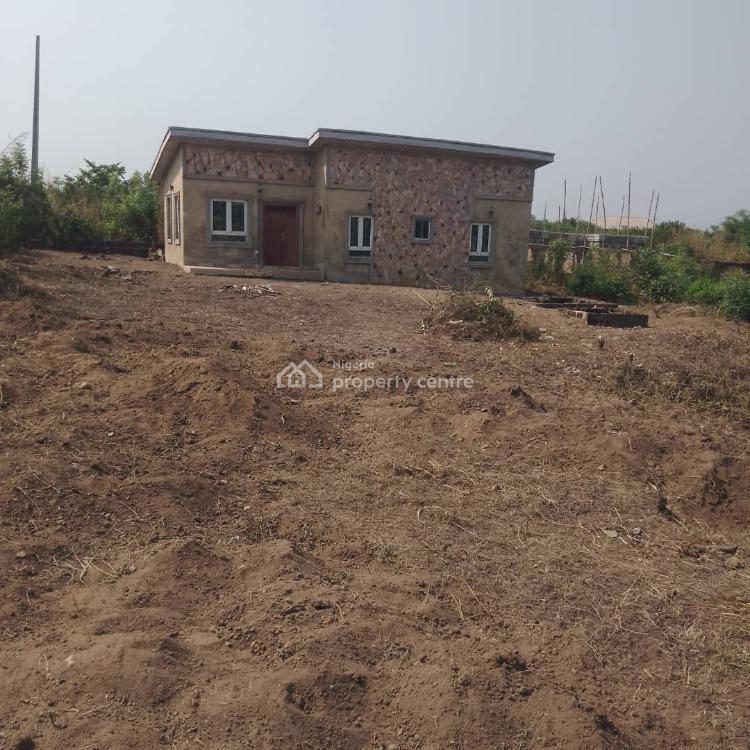 For Sale Full Plot Of Land With A Standard Two Bedrooms Apartment And