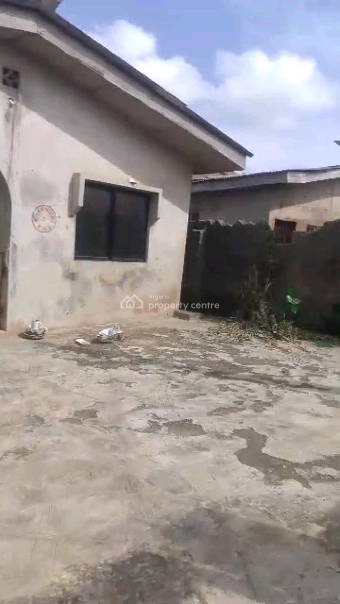 a Property with Good Integrity Test Consisting 4 Bedroom Flats, Agric Road,, Akesan, Alimosho, Lagos, Detached Bungalow for Sale