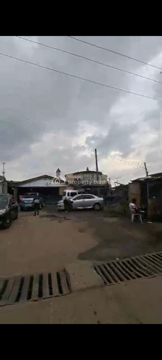900sqm( Almost 2plot)land Presently Use for Car Wash and Lounge in a S, No 77 Agege Motors Road Olosha Bus-stop Mushin Lagos., Mushin, Lagos, Land for Sale