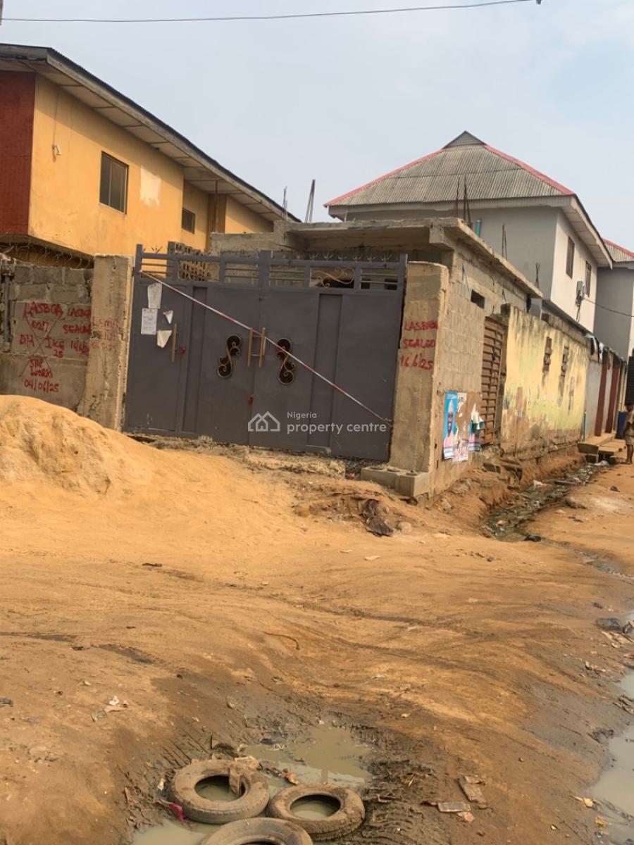 Quater Plot with a Building on Decking Level, Igando Road, Ikotun, Lagos, Terraced Bungalow for Sale