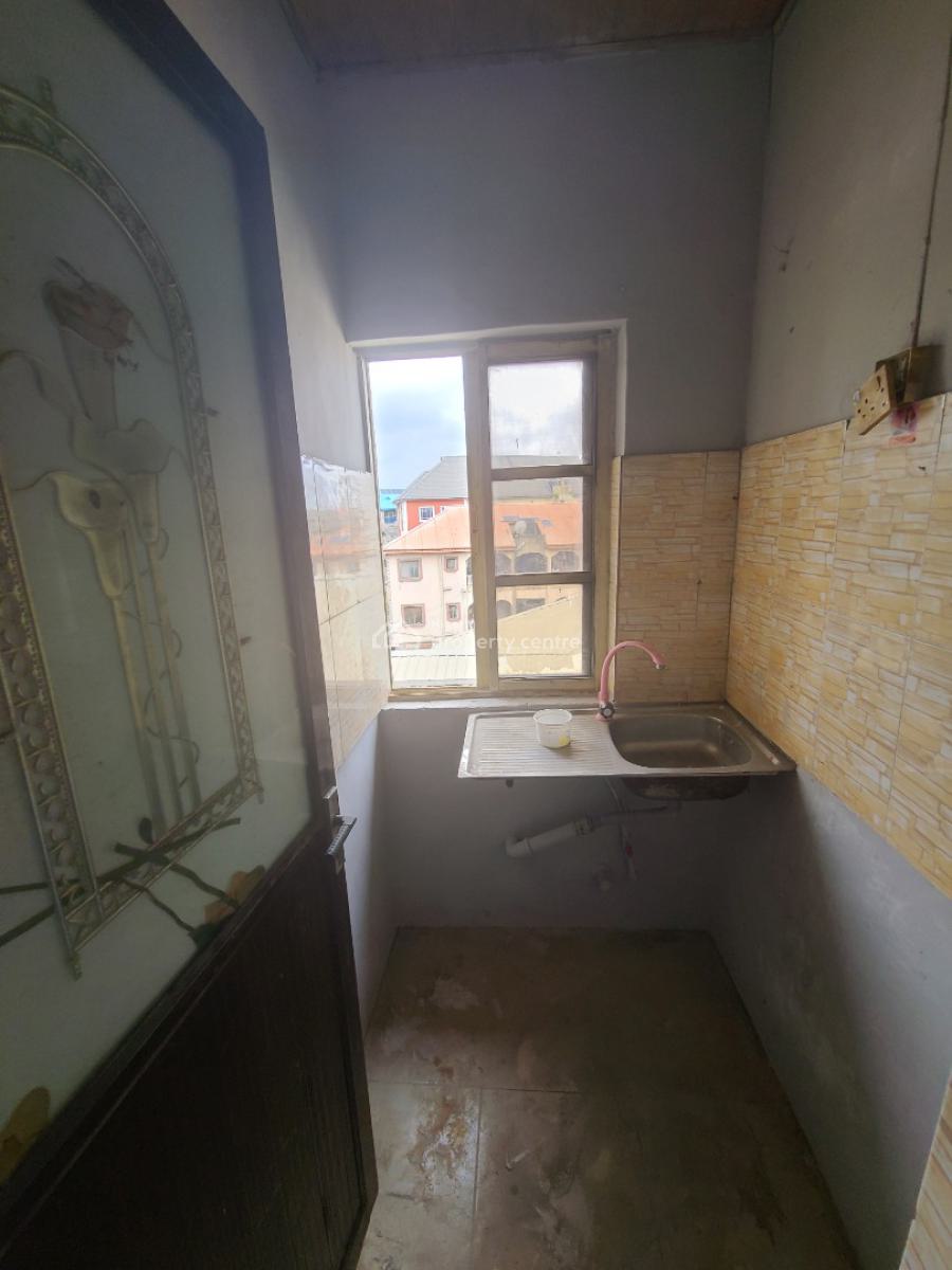 Decent 1bedroom Flat Upstairs with 1toilet 1bath, Off Aborishade Road, Lawanson, Surulere, Lagos, Mini Flat (room and Parlour) for Rent