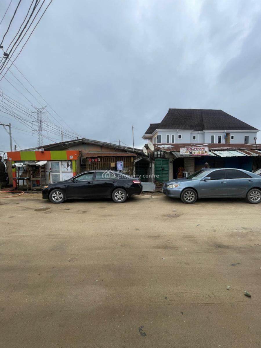 a Bungalow with Units of Rooms and Shops on a Full Plot of Land, Nnobi, Surulere, Lagos, Block of Flats for Sale