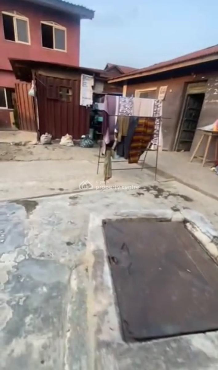 a Standard Solid Bungalow with a Tennement Building, Off Pedro Road, Shomolu, Lagos, Mixed-use Land for Rent