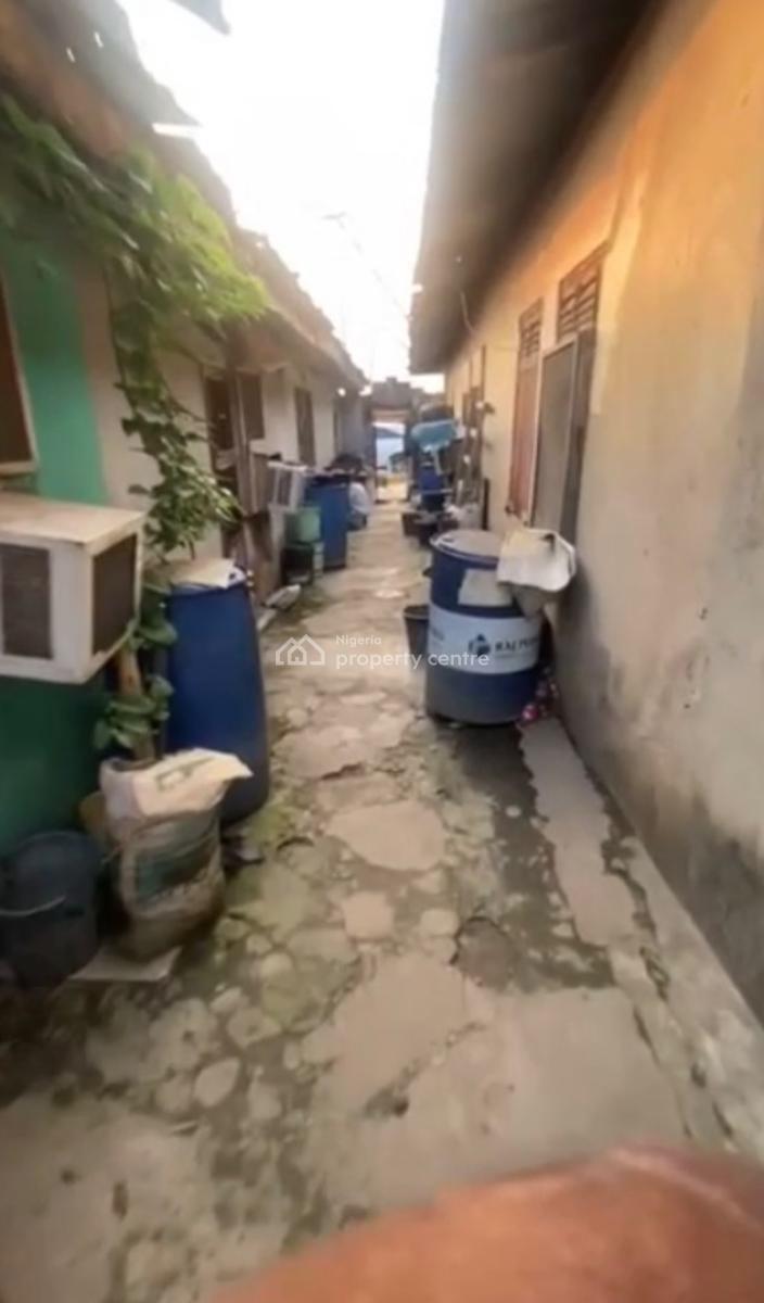 a Standard Solid Bungalow with a Tennement Building, Off Pedro Road, Shomolu, Lagos, Mixed-use Land for Rent
