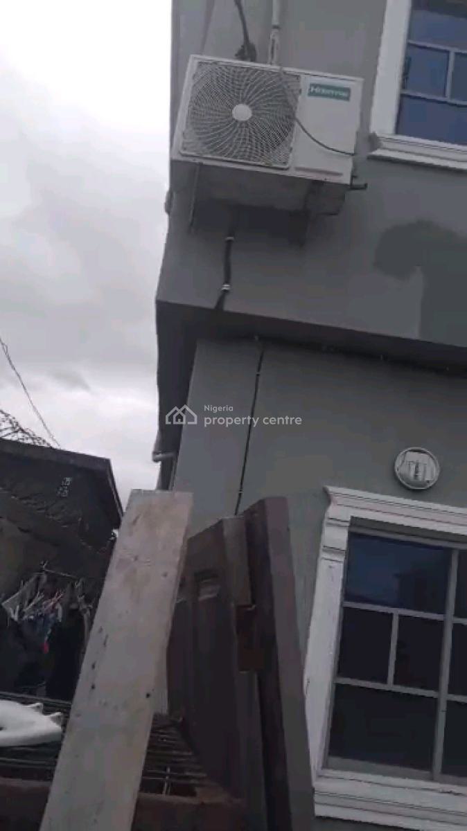 *a Strong Storey Building on a Half Plot of Land, Araromi Street, Bariga, Shomolu, Lagos, Block of Flats for Sale