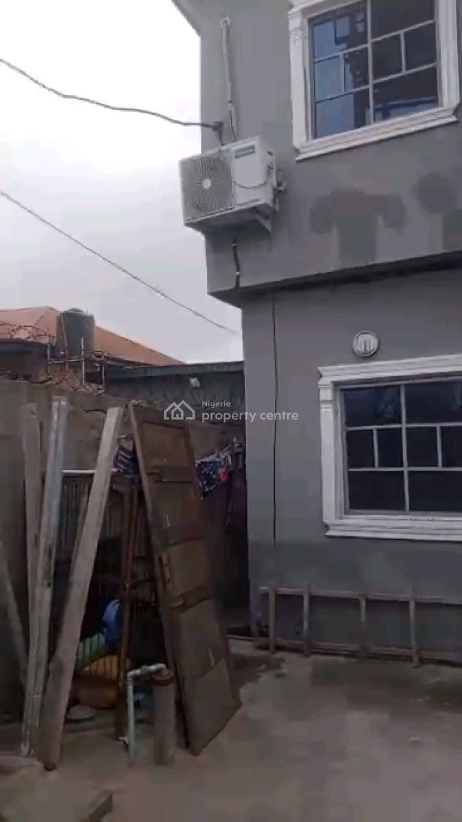 *a Strong Storey Building on a Half Plot of Land, Araromi Street, Bariga, Shomolu, Lagos, Block of Flats for Sale