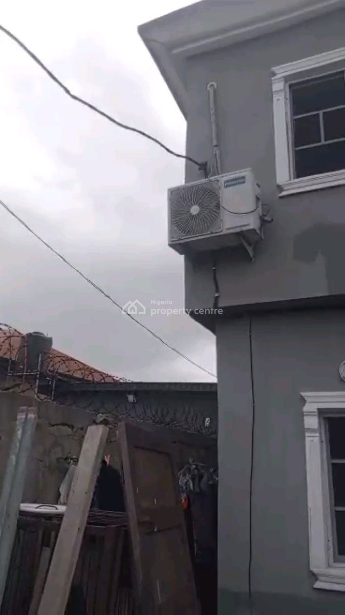 *a Strong Storey Building on a Half Plot of Land, Araromi Street, Bariga, Shomolu, Lagos, Block of Flats for Sale