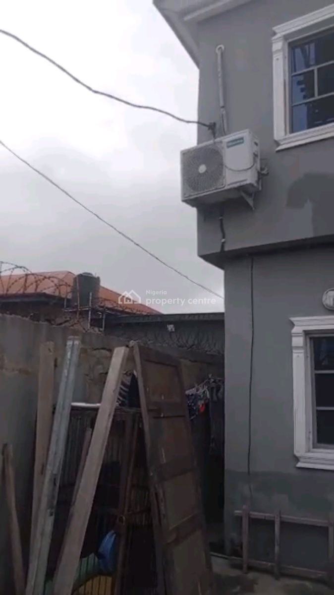 *a Strong Storey Building on a Half Plot of Land, Araromi Street, Bariga, Shomolu, Lagos, Block of Flats for Sale