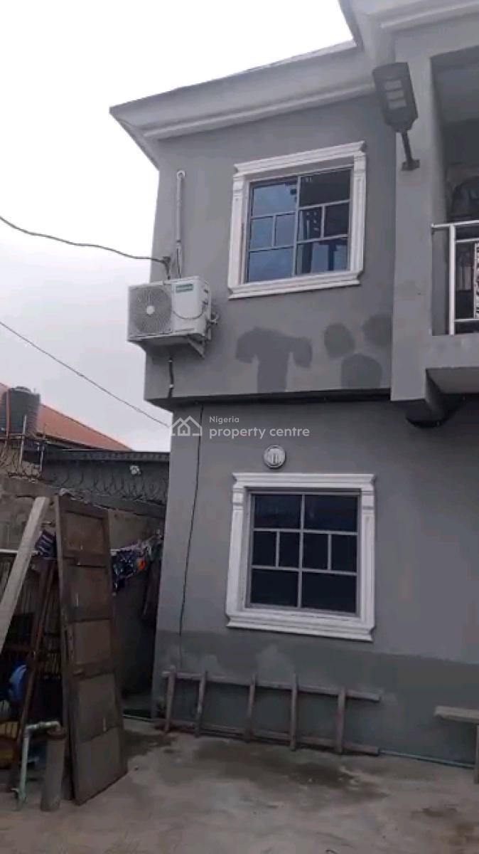 *a Strong Storey Building on a Half Plot of Land, Araromi Street, Bariga, Shomolu, Lagos, Block of Flats for Sale