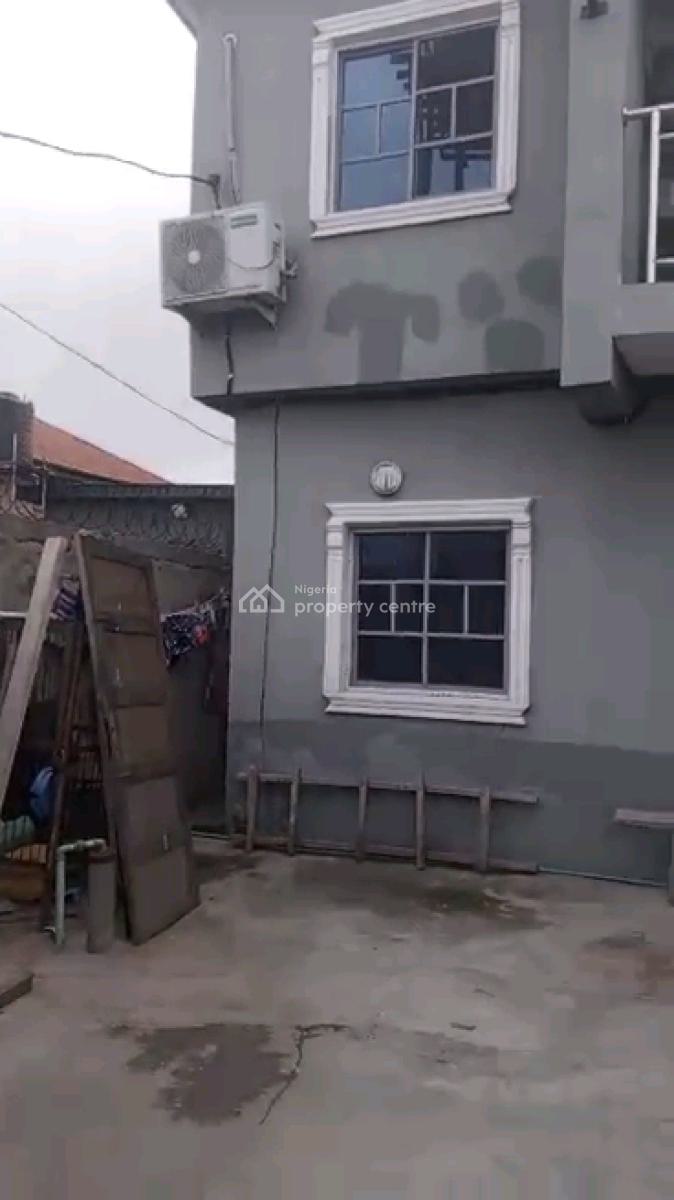 *a Strong Storey Building on a Half Plot of Land, Araromi Street, Bariga, Shomolu, Lagos, Block of Flats for Sale