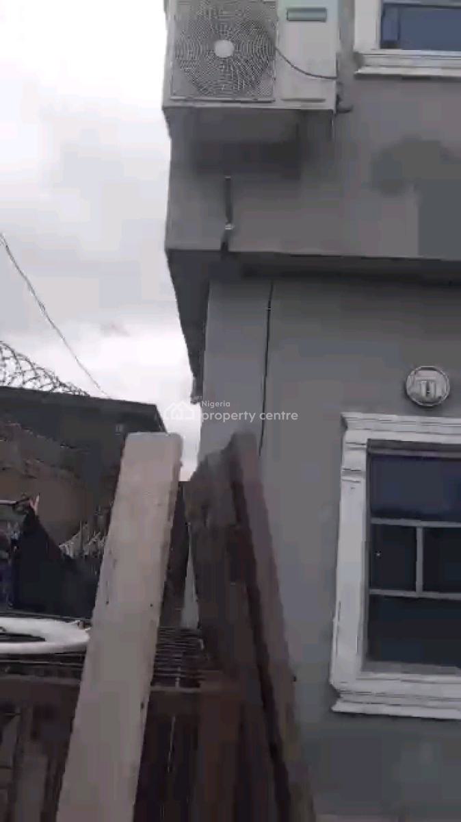 *a Strong Storey Building on a Half Plot of Land, Araromi Street, Bariga, Shomolu, Lagos, Block of Flats for Sale