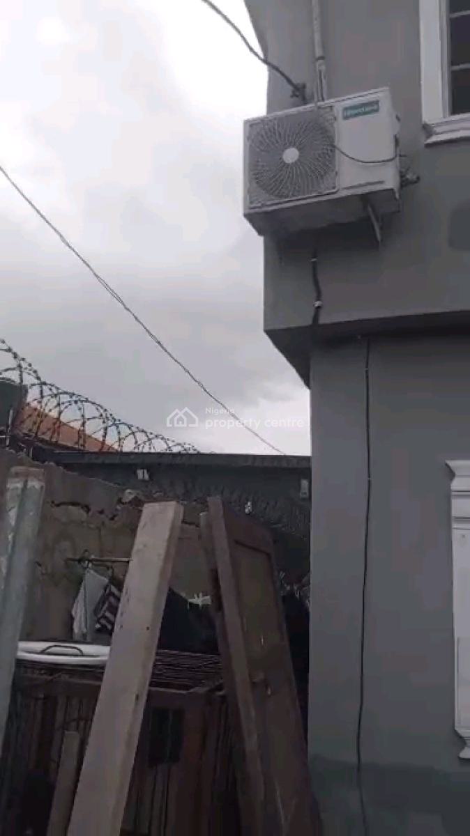 *a Strong Storey Building on a Half Plot of Land, Araromi Street, Bariga, Shomolu, Lagos, Block of Flats for Sale