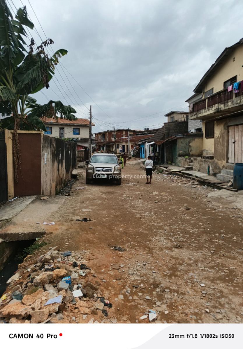 One Full Plot of Land with Demolishable Building in Ogba Central, Orimolade Street Off College Road, Ogba, Ikeja, Lagos, Block of Flats for Sale
