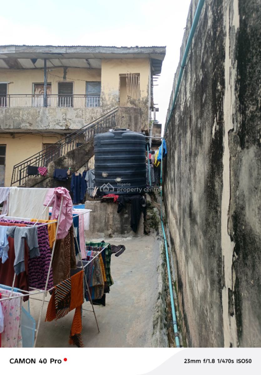 One Full Plot of Land with Demolishable Building in Ogba Central, Orimolade Street Off College Road, Ogba, Ikeja, Lagos, Block of Flats for Sale