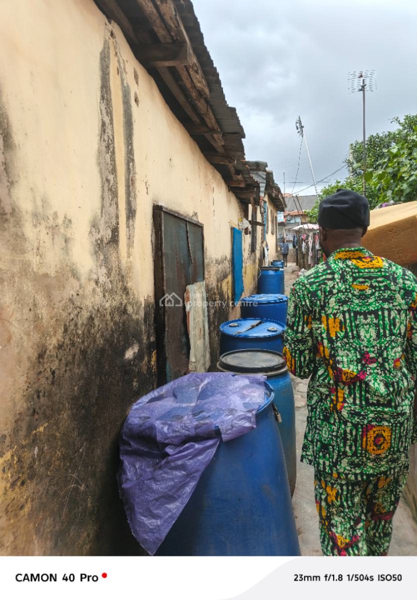 More Than Half Plot of Land with Demolishable Building on a Tarred Roa, Orimolade Street, Off College Road, Ogba, Ikeja, Lagos, Block of Flats for Sale