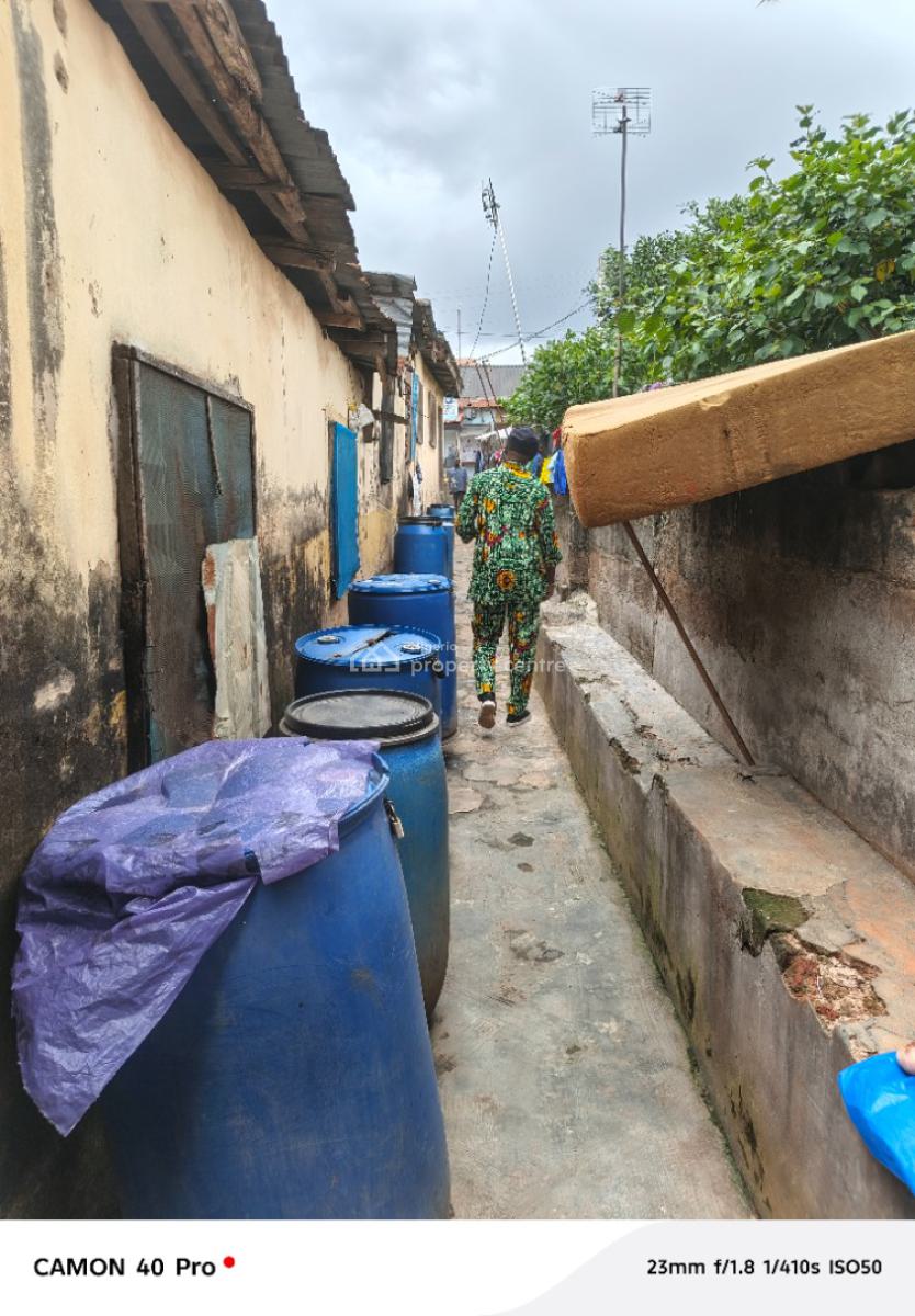 More Than Half Plot of Land with Demolishable Building on a Tarred Roa, Orimolade Street, Off College Road, Ogba, Ikeja, Lagos, Block of Flats for Sale