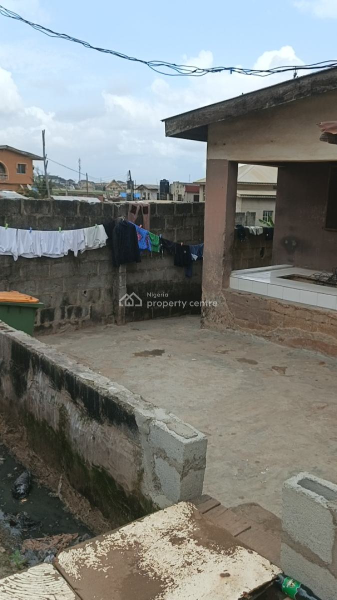 More Than Half Plot of Land with Demolishable Building on a Tarred Roa, Orimolade Street, Off College Road, Ogba, Ikeja, Lagos, Block of Flats for Sale