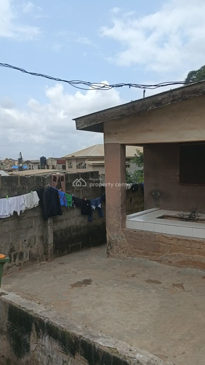 More Than Half Plot of Land with Demolishable Building on a Tarred Roa, Orimolade Street, Off College Road, Ogba, Ikeja, Lagos, Block of Flats for Sale