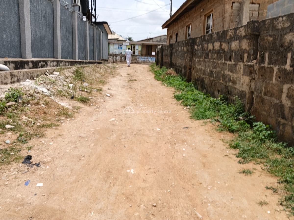 More Than Half Plot of Land Fence Gate Close to The Road, Ikola Command, Ipaja, Lagos, Mixed-use Land for Sale
