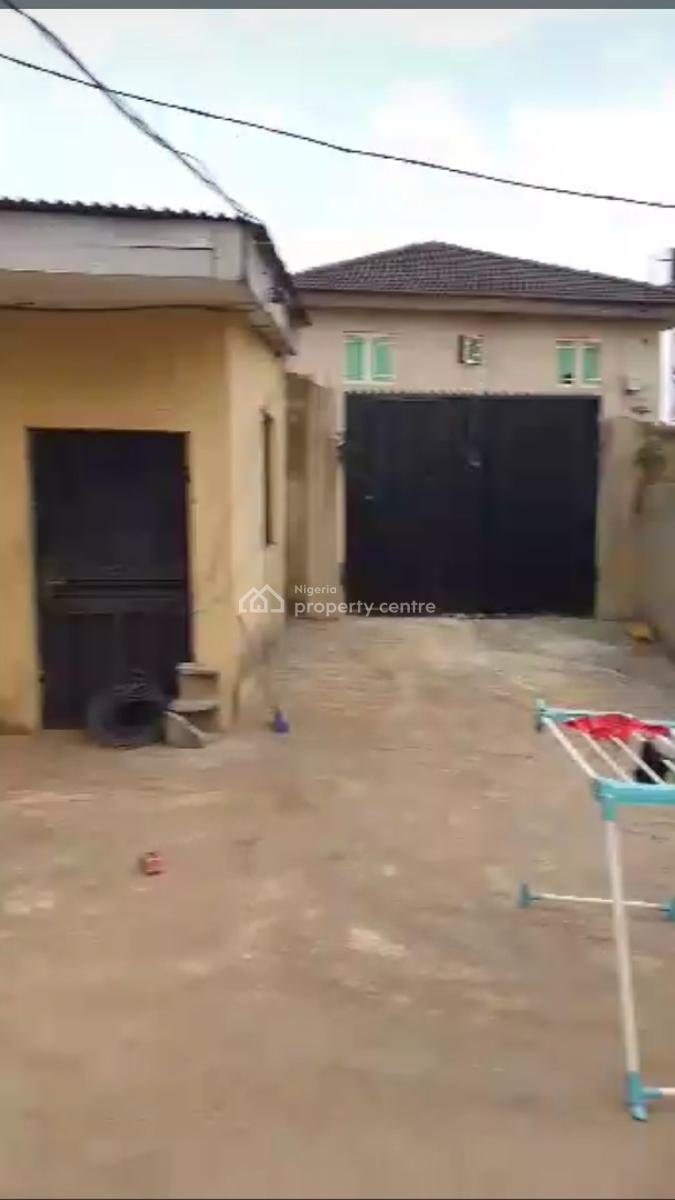 Bungalow on 30 By 100 Land with 2 Bedroom and Mini Flat,fenced & Gated, Isokan Estate,off Amule Bus-stop, Ipaja, Lagos, Block of Flats for Sale