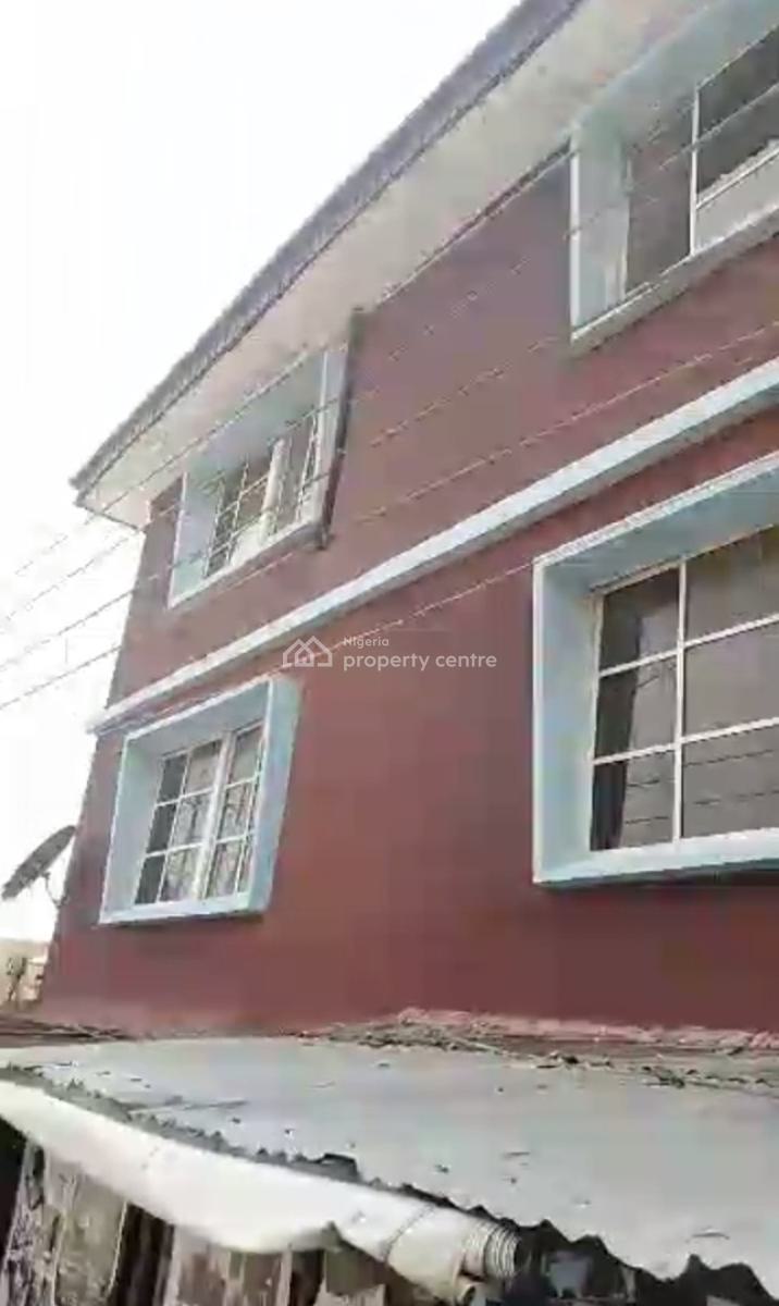 a Demonishable Two Storey Building, Ilupeju, Lagos, Block of Flats for Sale
