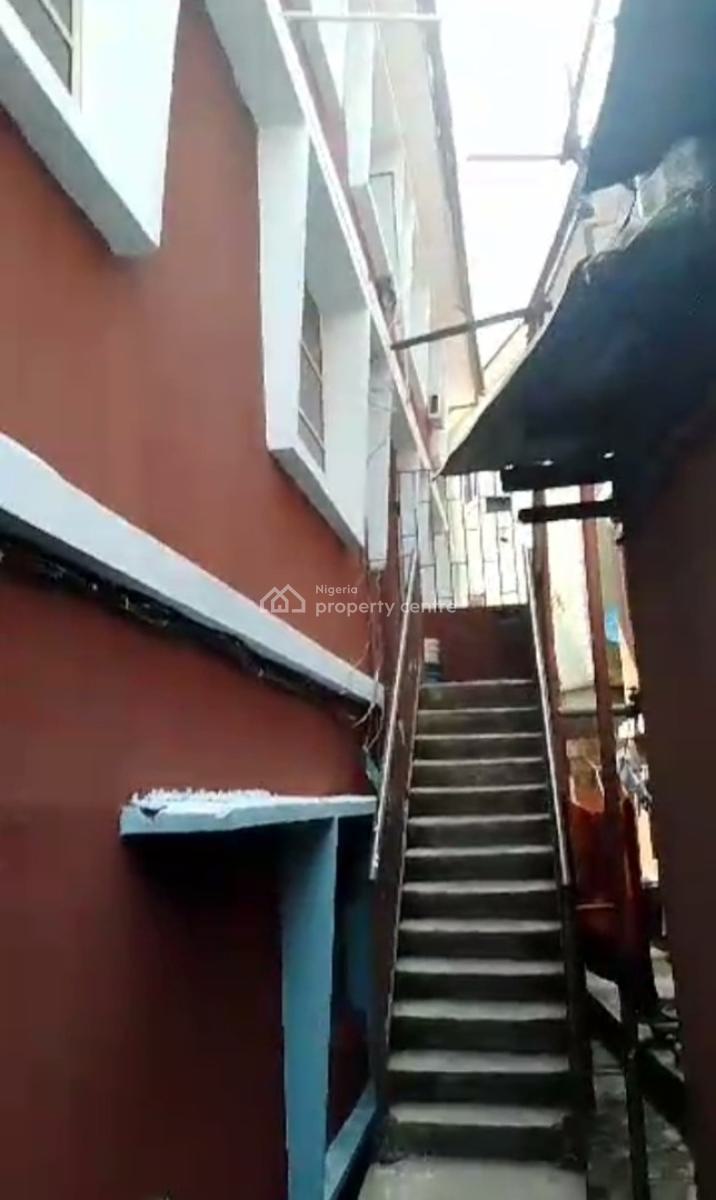 a Demonishable Two Storey Building, Ilupeju, Lagos, Block of Flats for Sale