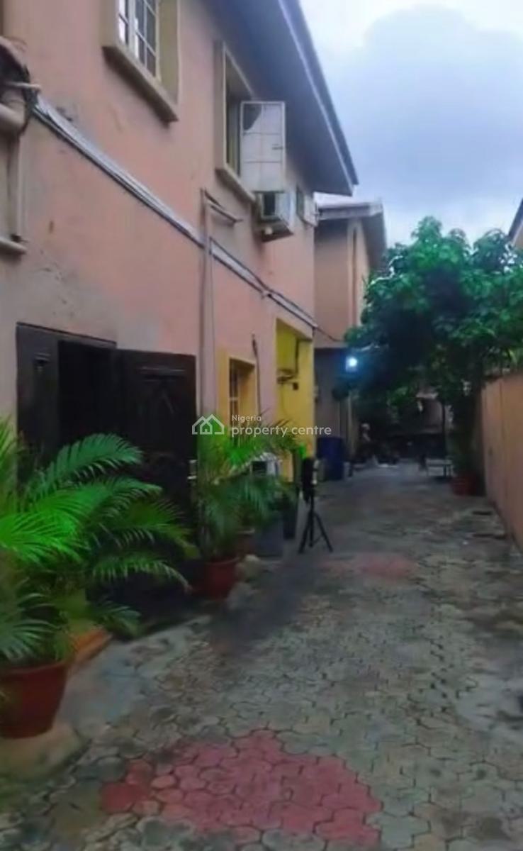 The Building Consist of 4 Bedroom Flat Upstairs, and 2 Sets of 2 Bed, Off Falolu Road, Surulere, Lagos, Block of Flats for Sale