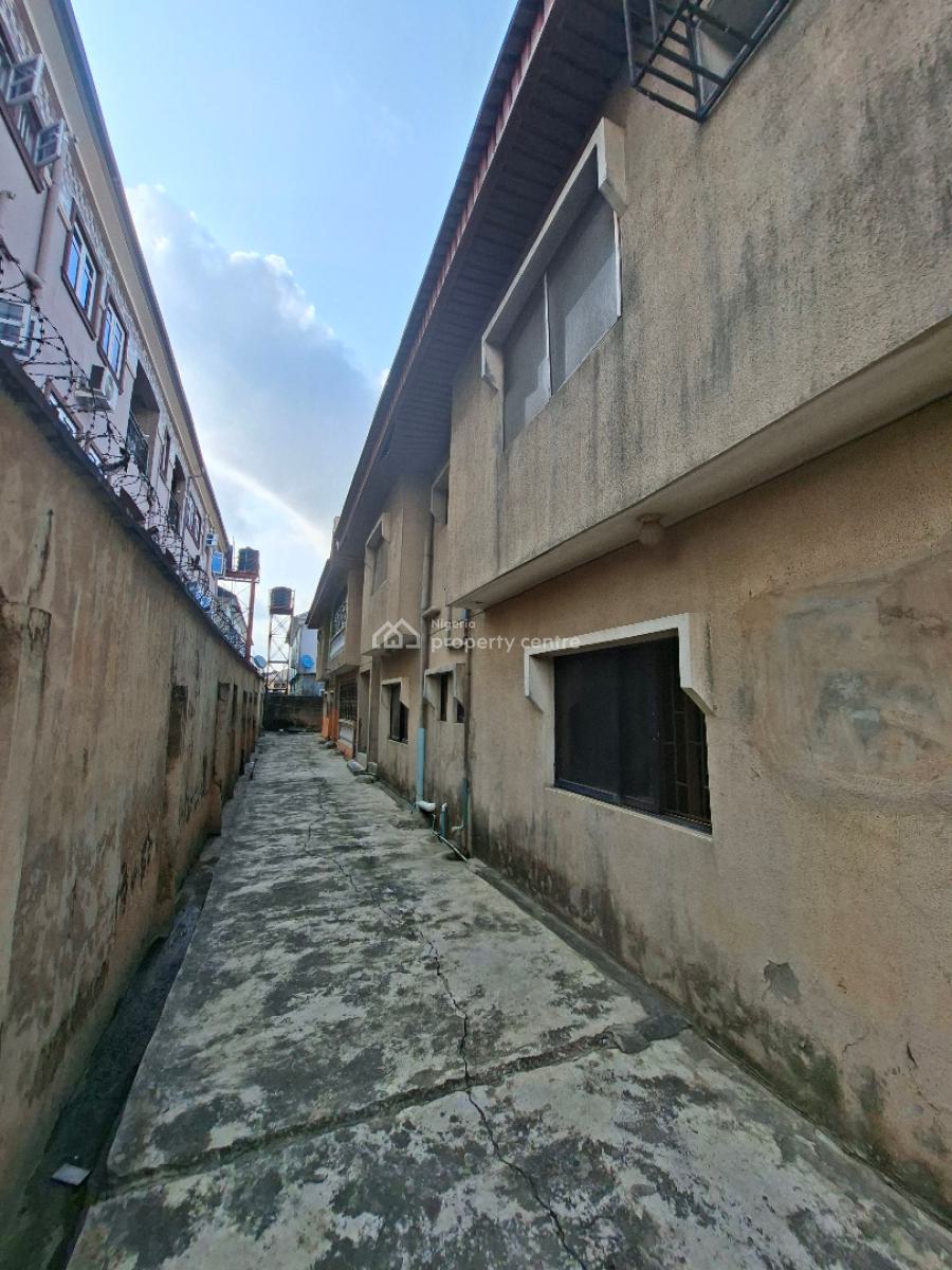 Solid Block of 4flats with Cofo, 9 Princess Adebimpe Street,off Alhaja Agbeke, Ago Palace, Isolo, Lagos, Block of Flats for Sale