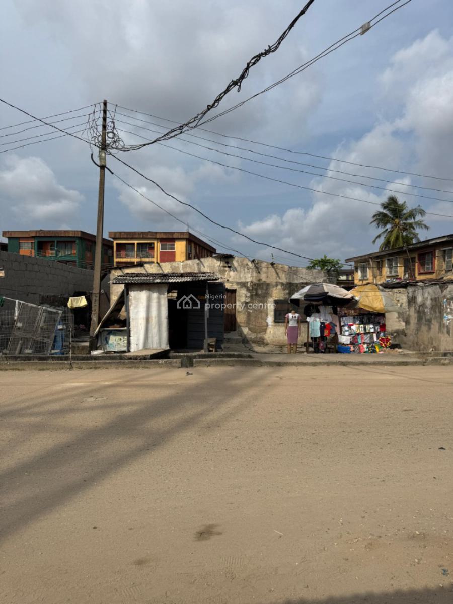 Demolishable Property on a Full Plot in The Very Strategic Area in Sur, Location: Off Adekunle Kuye Surulere.        Net Price: N150m, Surulere, Lagos, Land for Sale
