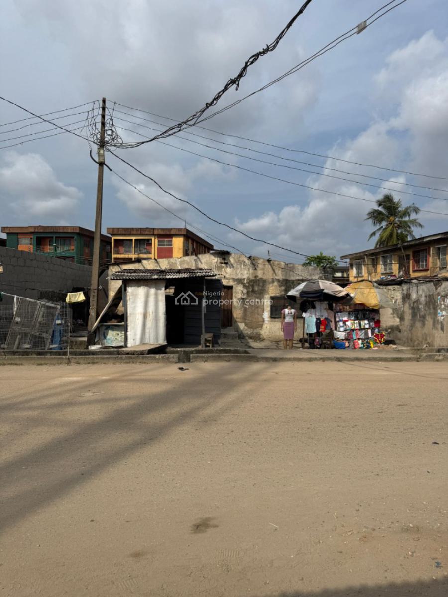 Demolishable Property on a Full Plot in The Very Strategic Area in Sur, Location: Off Adekunle Kuye Surulere.        Net Price: N150m, Surulere, Lagos, Land for Sale