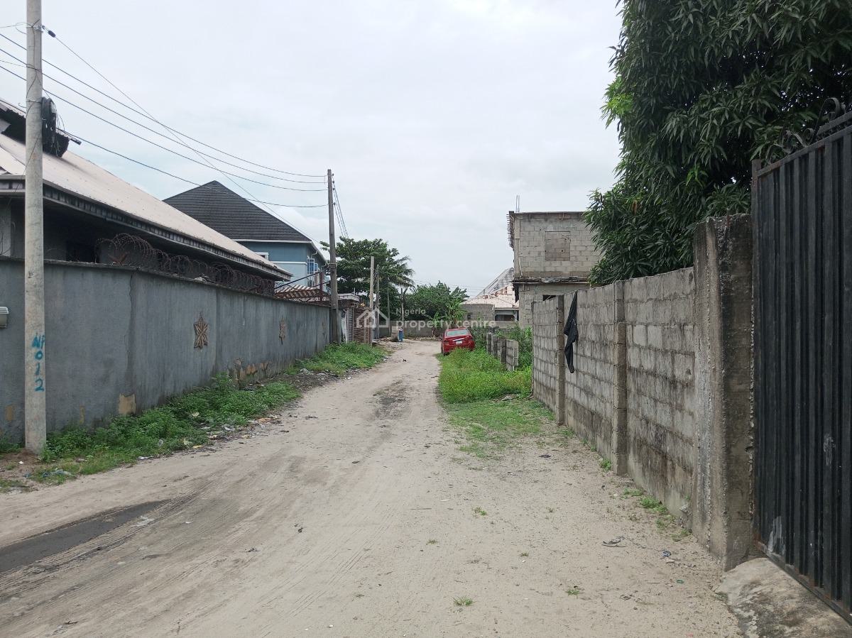 Fenced Cornerpiece Land  with Bungalow in Developed Location, Ogombo, Ajah, Lagos, Land for Sale