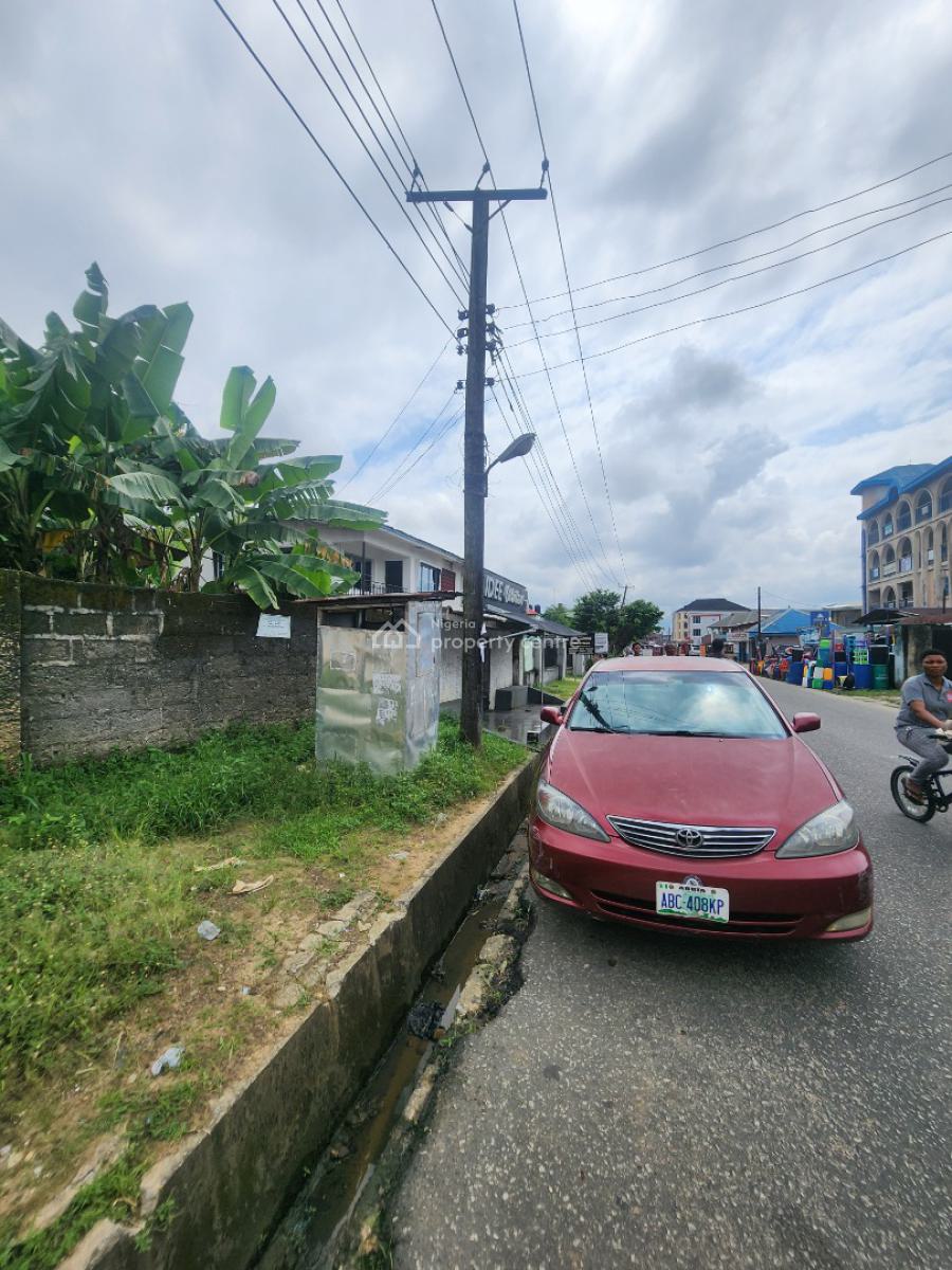Strategically Located Plot of Land in The Heart of Town, Along Udotungubo Street, Uyo, Akwa Ibom, Mixed-use Land for Sale