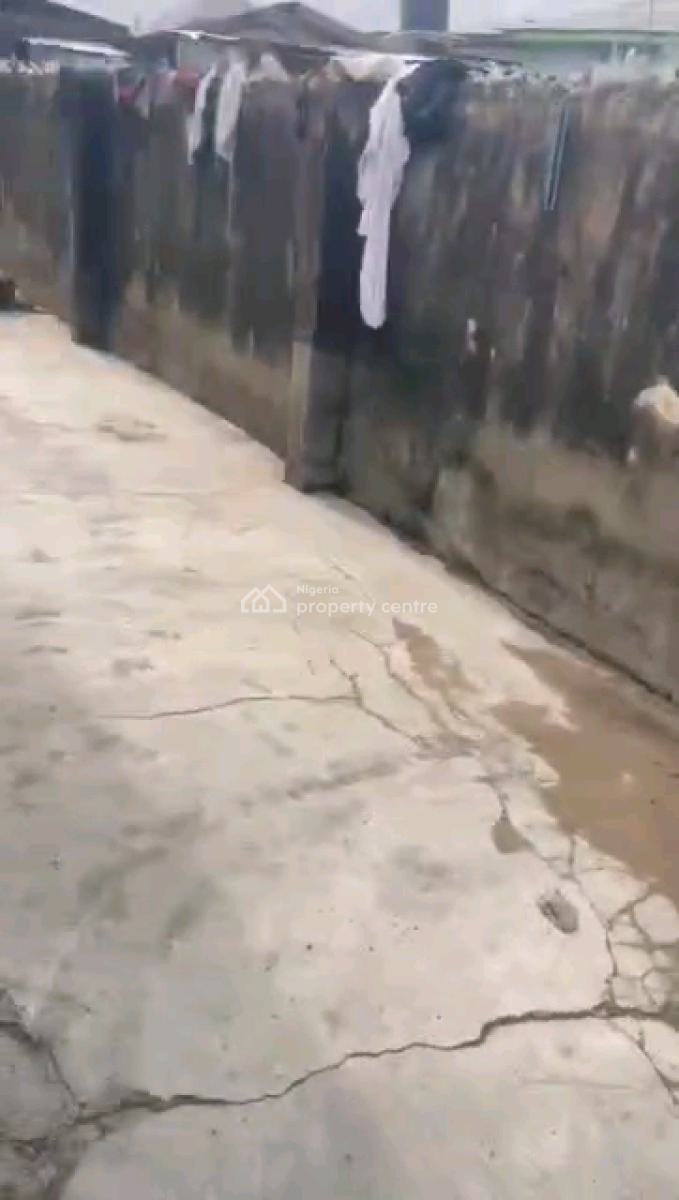 a Strategic Location of a Bungalow Sitting on 420.660 Square Meters, Latif Fagbemi Street, Off Osinfolarin Street, Akoka, Yaba, Lagos, Block of Flats for Sale