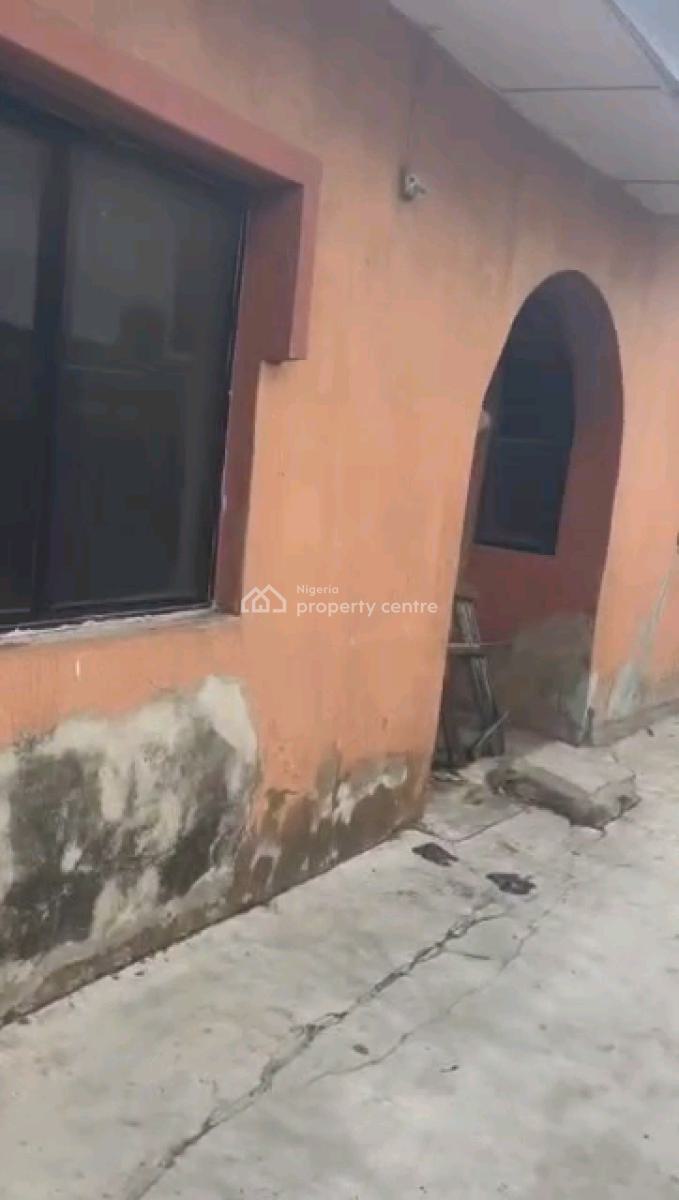 a Strategic Location of a Bungalow Sitting on 420.660 Square Meters, Latif Fagbemi Street, Off Osinfolarin Street, Akoka, Yaba, Lagos, Block of Flats for Sale