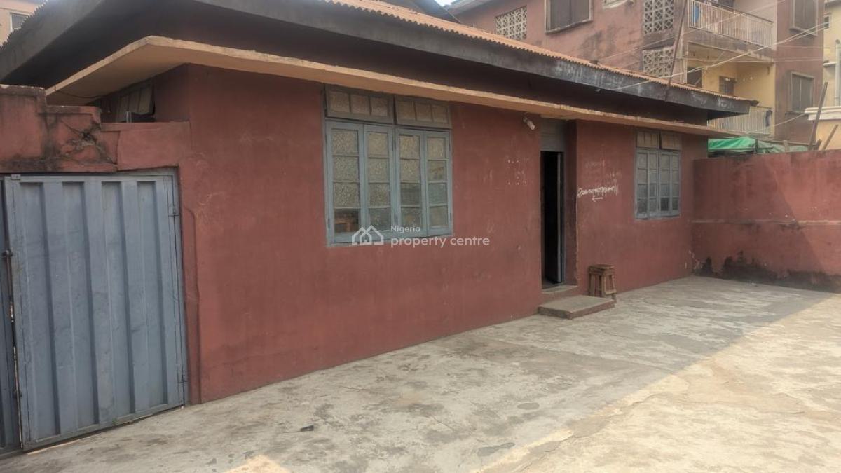 a Bungalow + Structure at The Back Sitting on 556 Sqm of Land, Mushin, Lagos, Land for Sale