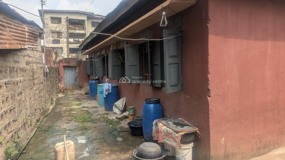 a Bungalow + Structure at The Back Sitting on 556 Sqm of Land, Mushin, Lagos, Land for Sale