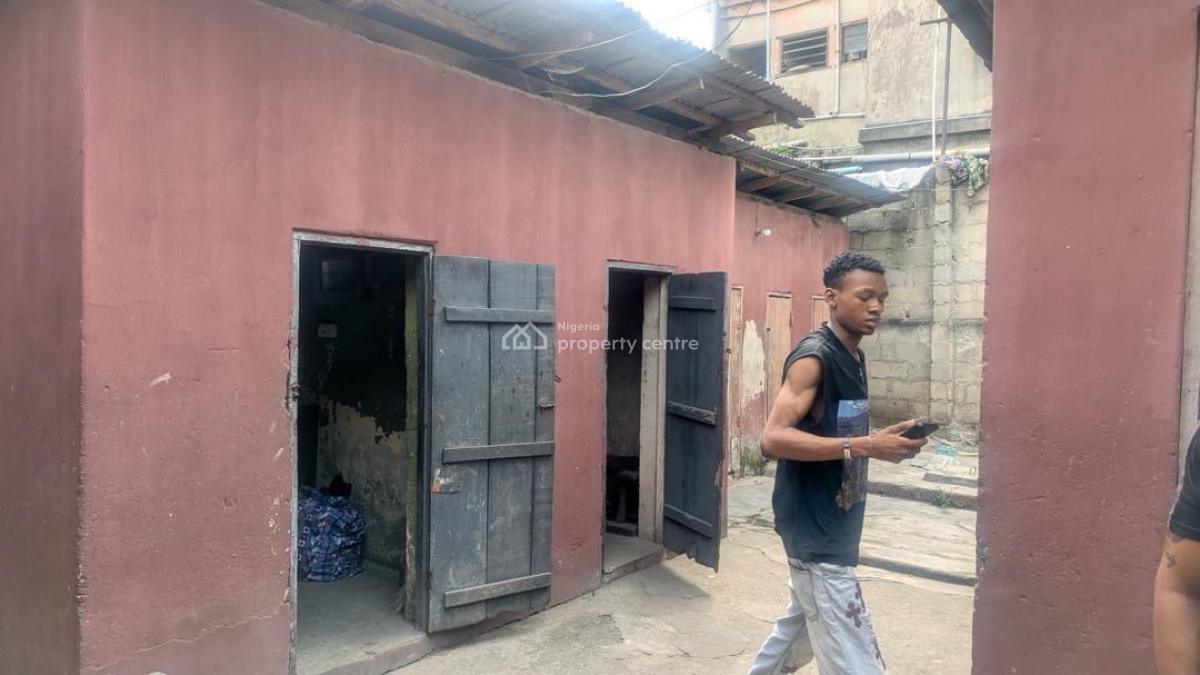 a Bungalow + Structure at The Back Sitting on 556 Sqm of Land, Mushin, Lagos, Land for Sale