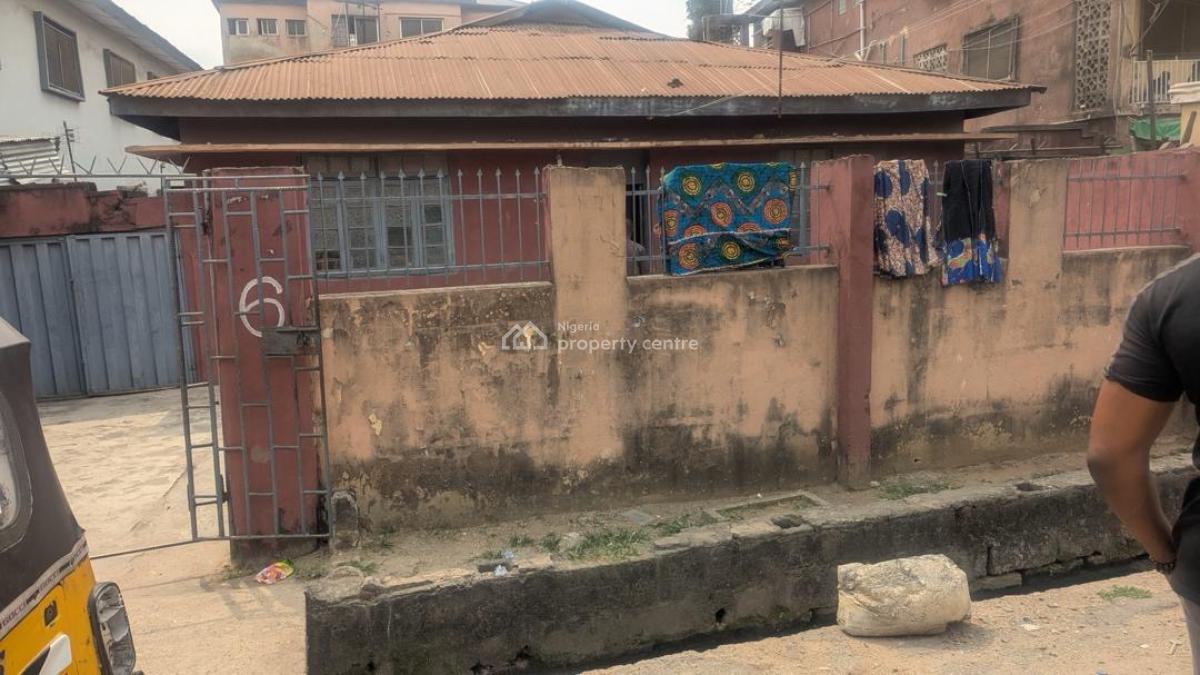 a Bungalow + Structure at The Back Sitting on 556 Sqm of Land, Mushin, Lagos, Land for Sale