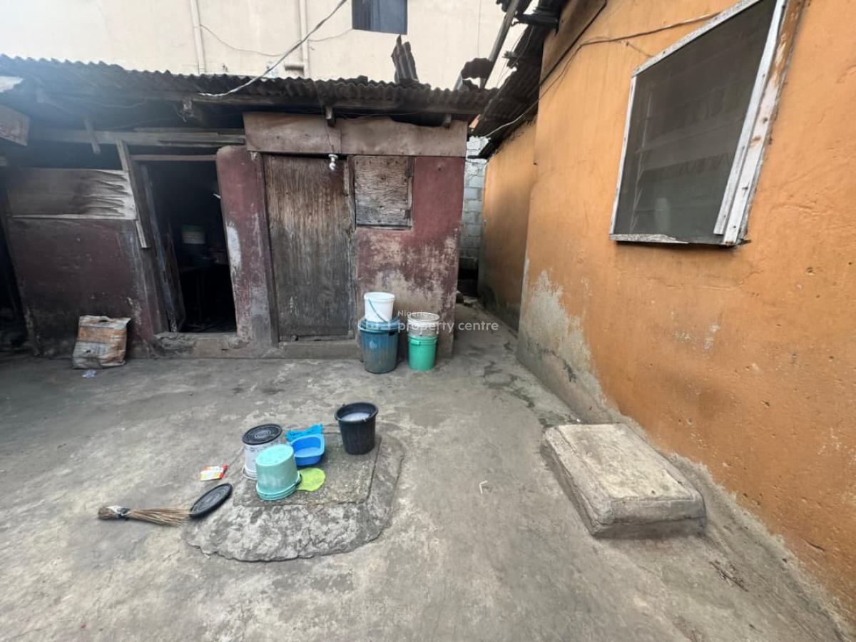 a Full Plot of Land Fenced and Gated with Demlishable Bungalow, Ogba, Ikeja, Lagos, Mixed-use Land for Sale