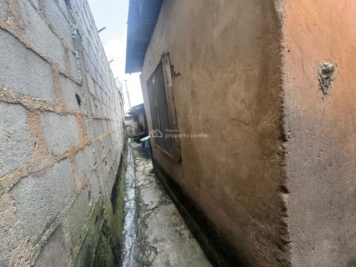 a Full Plot of Land Fenced and Gated with Demlishable Bungalow, Ogba, Ikeja, Lagos, Mixed-use Land for Sale