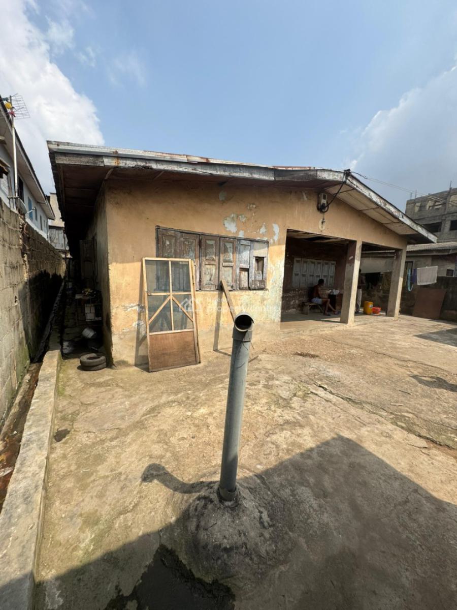 a Full Plot with a Demolished Bungalow on It, Behind Dideolu Estate, Ogba Ikeja, Ogba, Ikeja, Lagos, Mixed-use Land for Sale
