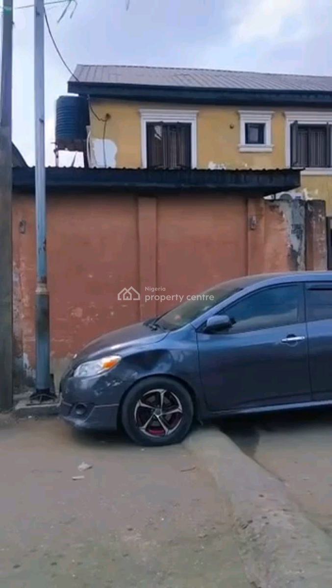 a Very Solid and Renovtable Storey Building at a Cornerpiece, Off Akinhanmi Street, Surulere, Lagos, Block of Flats for Sale