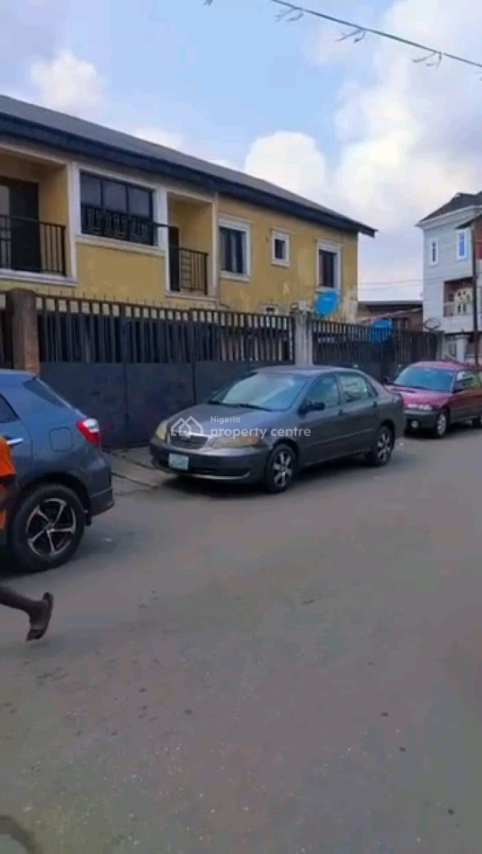 a Very Solid and Renovtable Storey Building at a Cornerpiece, Off Akinhanmi Street, Surulere, Lagos, Block of Flats for Sale