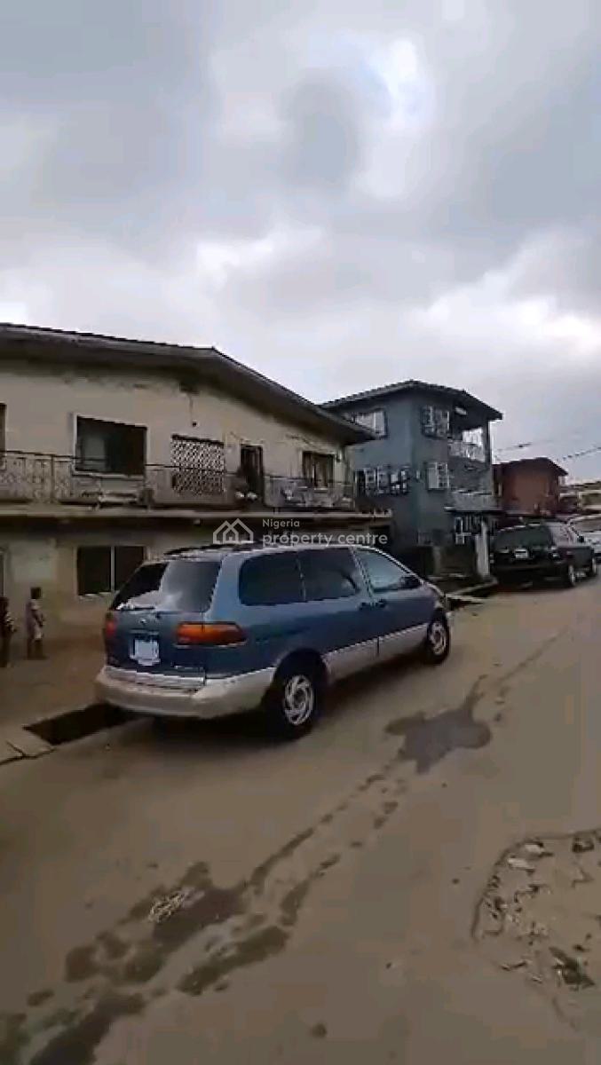 a Dilapidated Storey Building on a Tarred Road, Johnson Street, Pedro, Gbagada, Lagos, Mixed-use Land for Sale