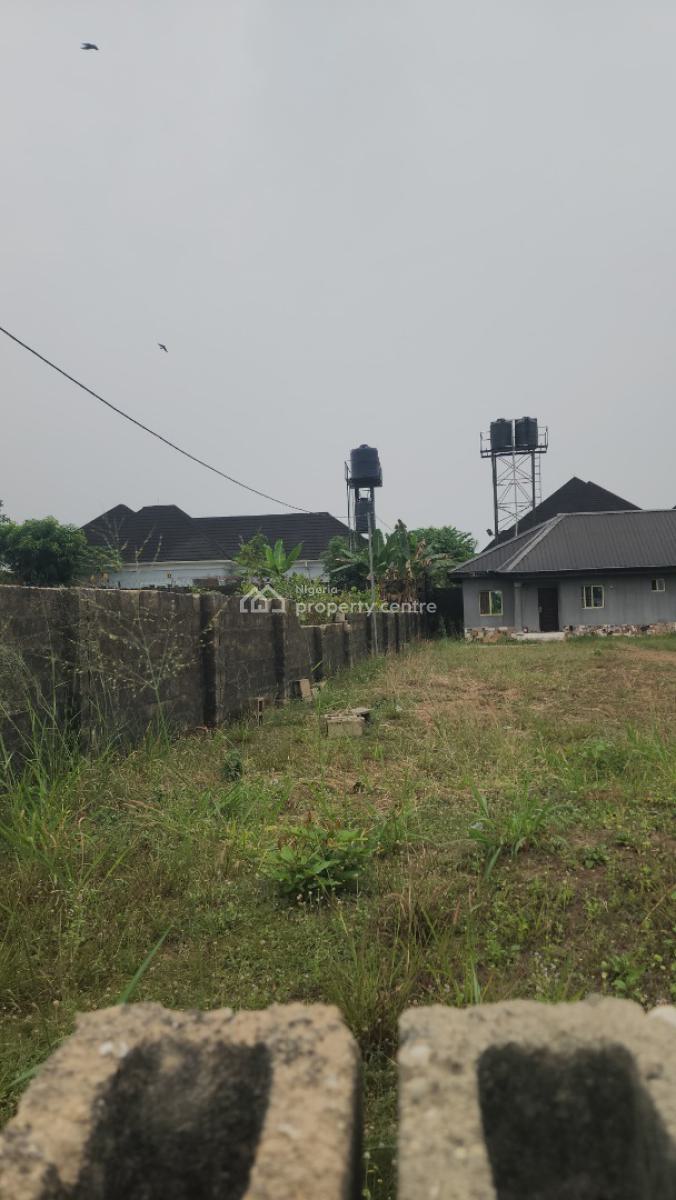 Fantastic and Strategically Located Dry Land and a Bungalow, Shelter Afrique Estate, Uyo, Akwa Ibom, Residential Land for Sale