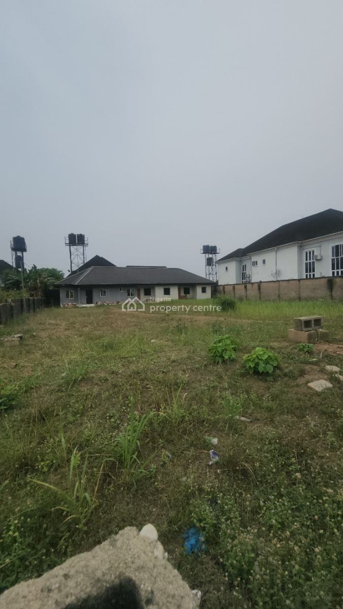 Fantastic and Strategically Located Dry Land and a Bungalow, Shelter Afrique Estate, Uyo, Akwa Ibom, Residential Land for Sale