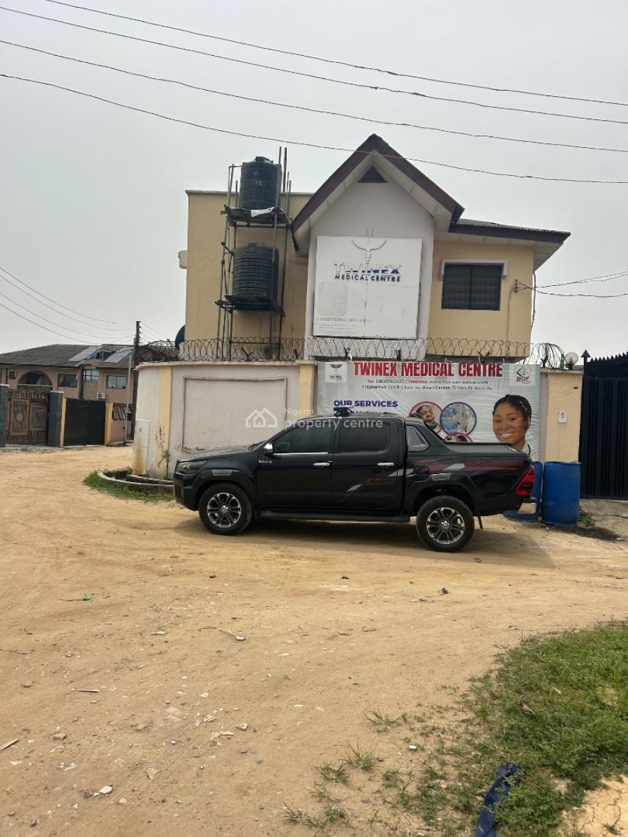 a 2 Units of 3bedrooms Flat and Miniflat (used for Hospital at The Mom, Ire Akari Estate, Ori-okuta, Agric, Ikorodu, Lagos, Block of Flats for Sale