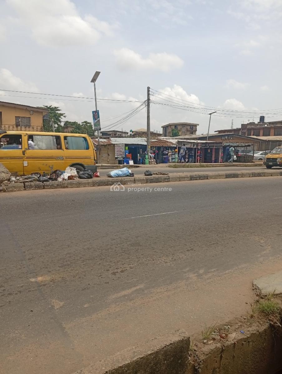 Commercial Plot with Demolishable Structure Along Major Road, Idimu Road Okunola Bus Stop, Egbeda, Alimosho, Lagos, Commercial Land for Rent